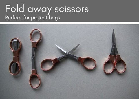 Grey background with rose gold fold away scossors shown in four positions L-R: fully closed, extended lengthwise, extended and blades open, extended and blades shut.