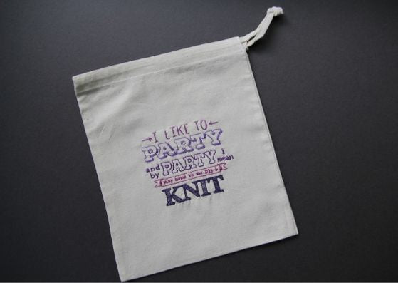 Grey background with natural cotton bag embroidered.  Left bag says "I like to party and by party I mean stay home with my pjs on and knit" in various colours of purple thread.